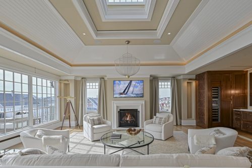 How Large Windows and Open Layouts Transform Modern Coastal Living Rooms
